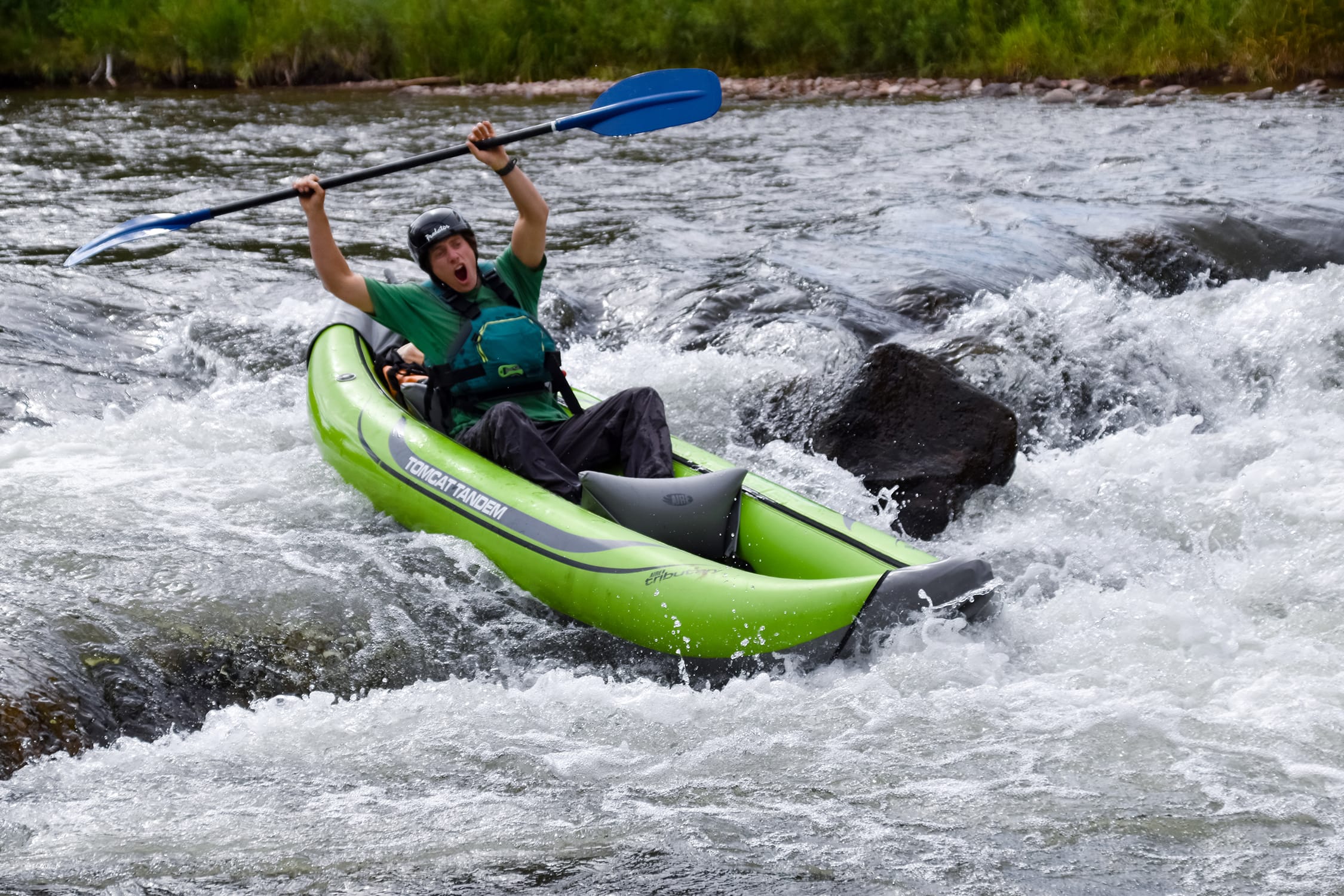 man on an inflatable kayaking trip in Aspen