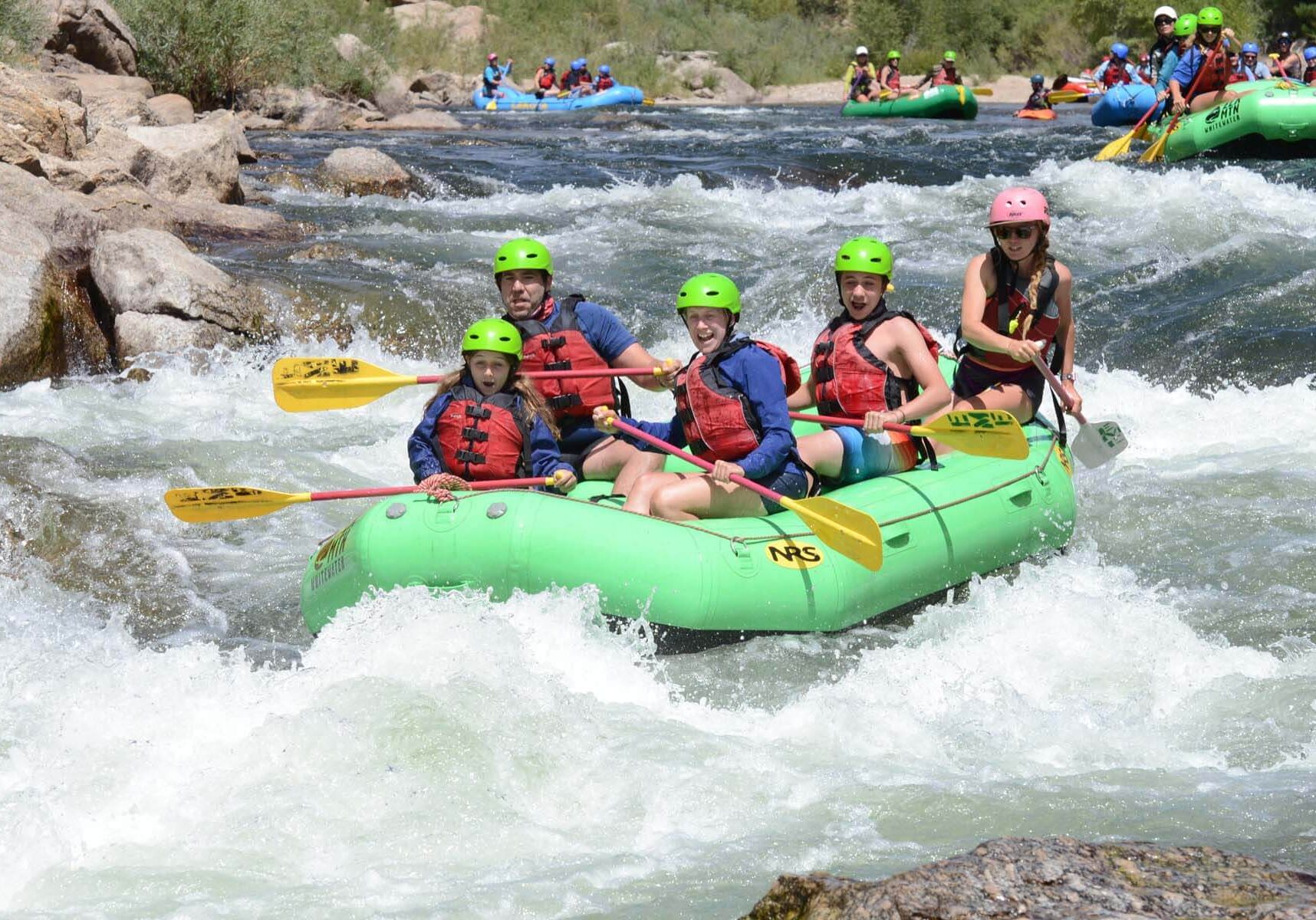 A family white water rafting on Browns Canyon in Colorado